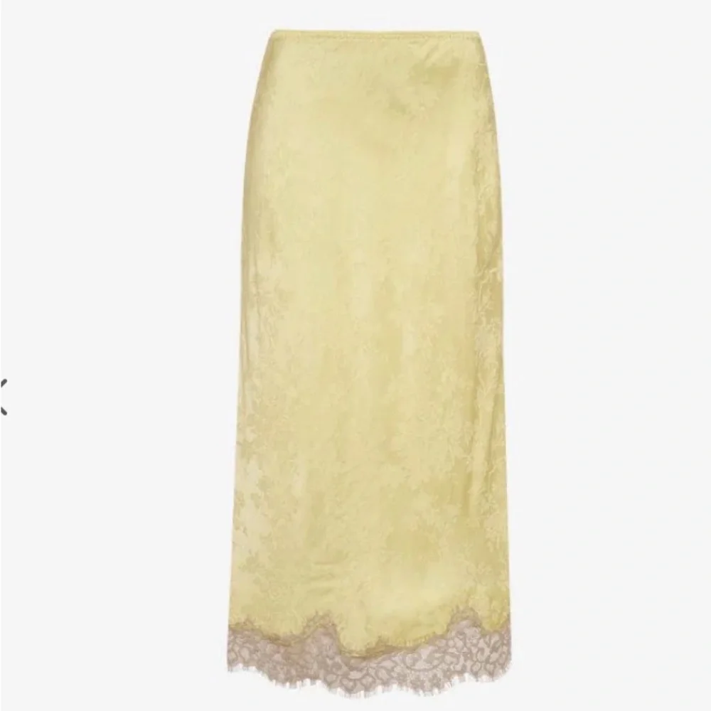 Rumored Pale Yellow Midi Skirt with Lace Hem